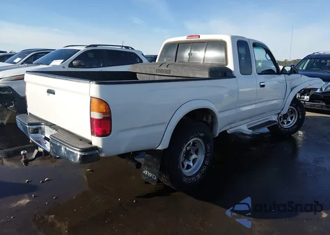 1999 Toyota Tacoma из США, поврежденный, VIN 4TAWN72N3XZ506002